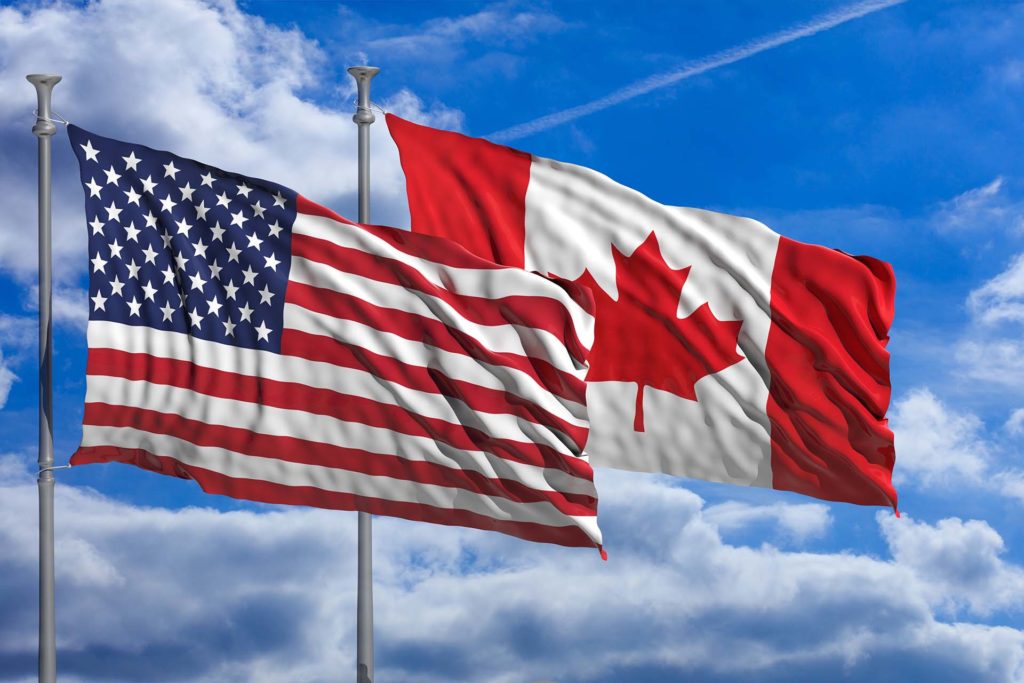 United States and Canadian flags representing cross-border tax services